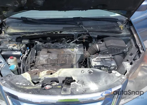 2010 Honda Odyssey Ex-L z USA, uszkodzony, nr VIN 5FNRL3H73AB074422